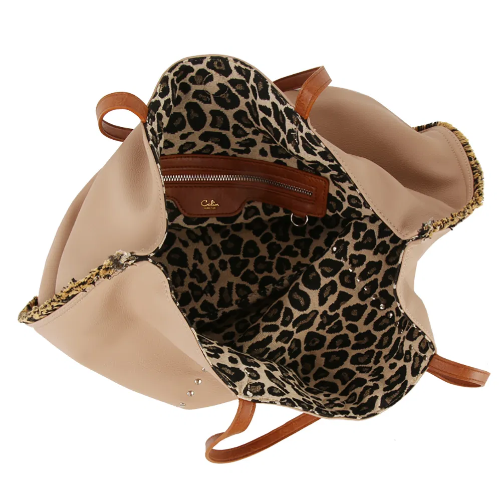 2026 moda Mujeres Bolsos Gran Capacidad Bolsos al por Mayor con Remaches Bolsos Compradores de Leopardo Reversibles Fabricantes