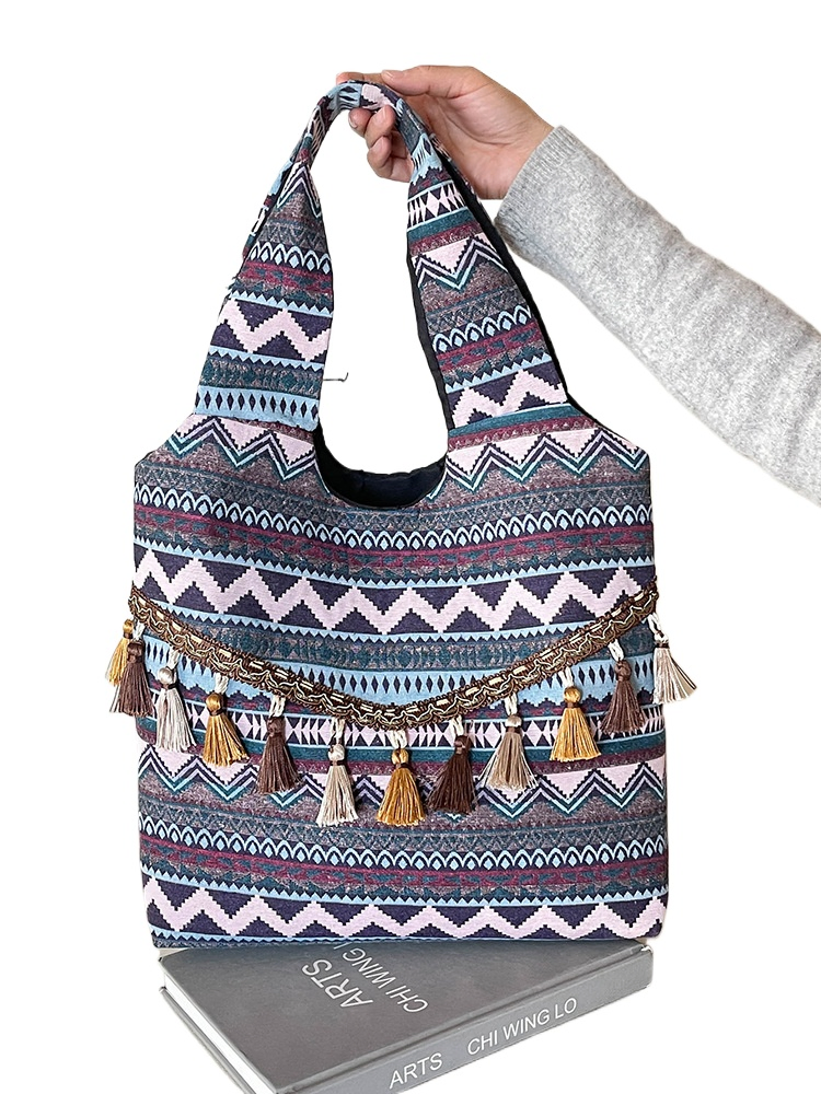 Nuevo estilo étnico bolso de gran capacidad con cierre abierto forro de poliéster correa de hombro personalizada con borlas bolso bohemio para mujeres