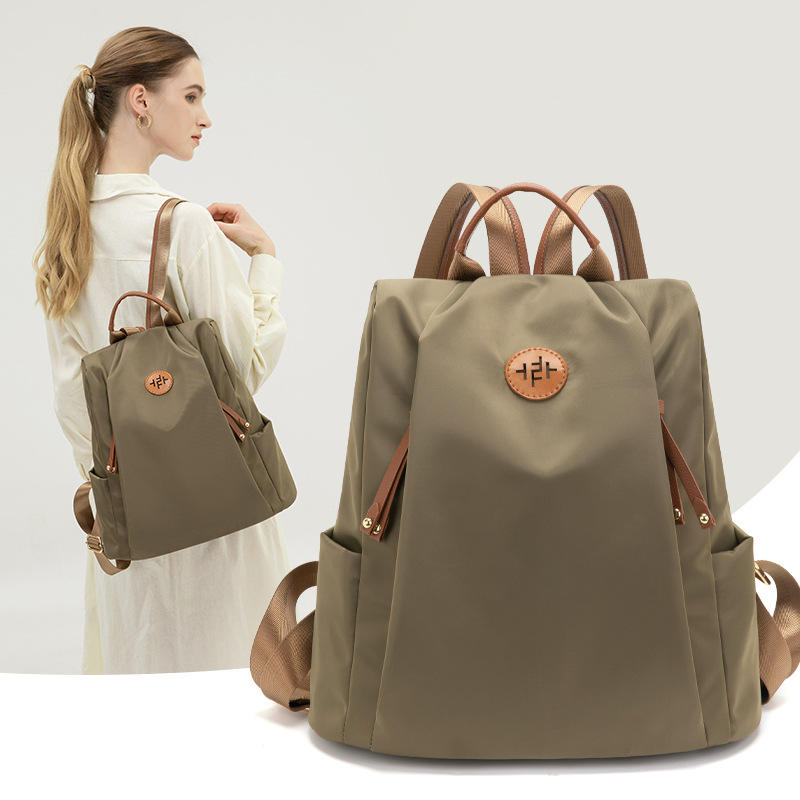 Mochila de nylon impermeable para mujeres con sistema avanzado antirrobo, ligera, popular en Corea, de gran capacidad 20-35L cierre de cremallera, de moda