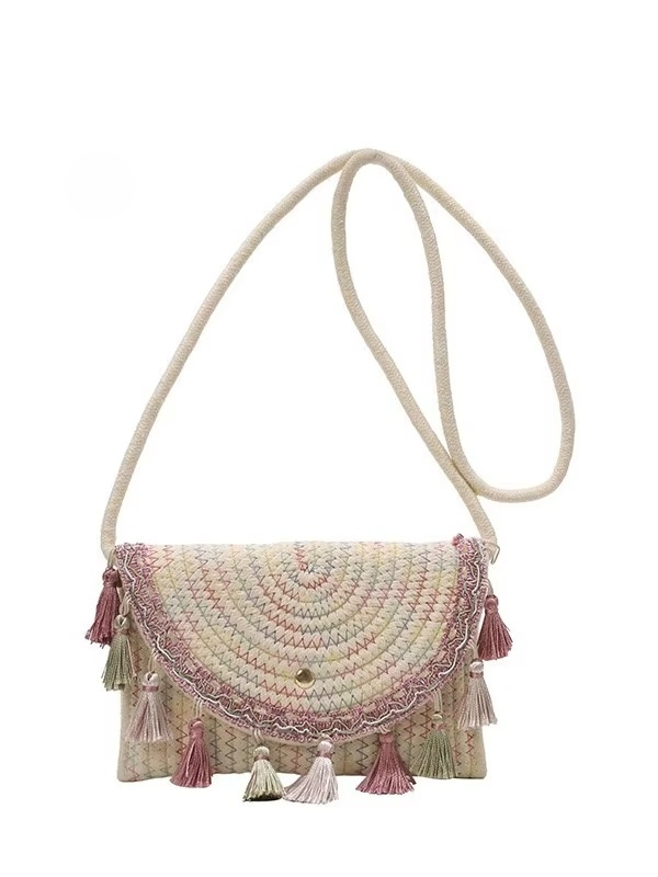 Bolso de mano de paja tejido al estilo bohemio con flecos y forro de poliéster y cierre de tapa para mujeres