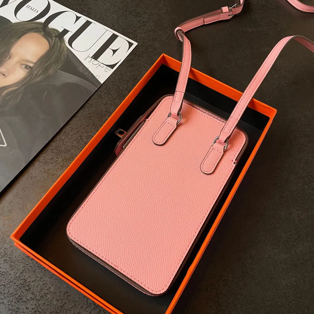 Cartera de cuero de vaca en color naranja