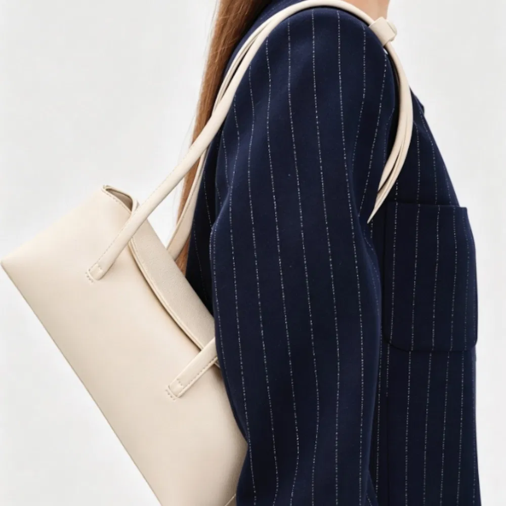 Bolsa de mano de diseño avanzado para mujer, tote de lujo con solapa plegable y cierre magnético, bolso de cuero PU de moda
