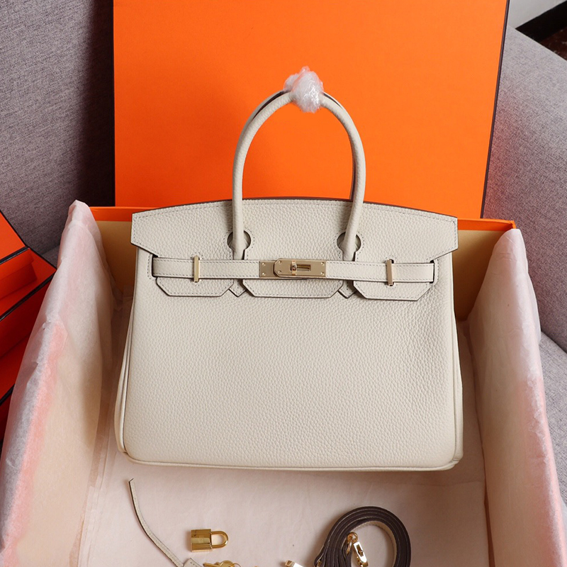 Tienda en línea de réplicas de bolsas de lujo de diseñador para mujeres, de alta calidad, con encanto de piel de vaca, tote de cuero genuino, bolso de mano