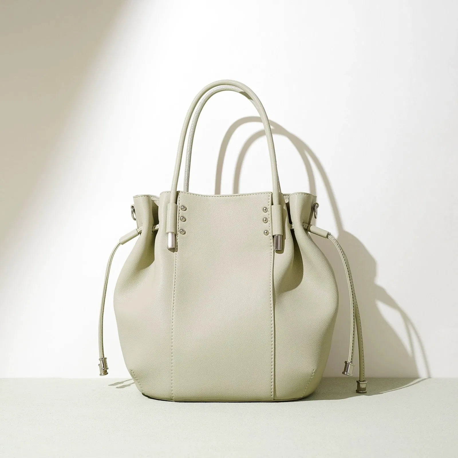 Venta al por mayor de fábrica diseño personalizado tamaño alta calidad textura de cuero genuino bolso para mujeres