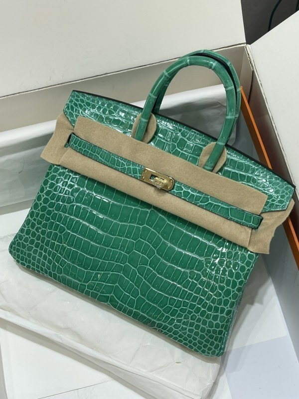 2025 Fábrica OEM con logo Bolsos de lujo hechos a mano para mujeres Bolsa tote para damas Bolsos de cuero vegano trenzados