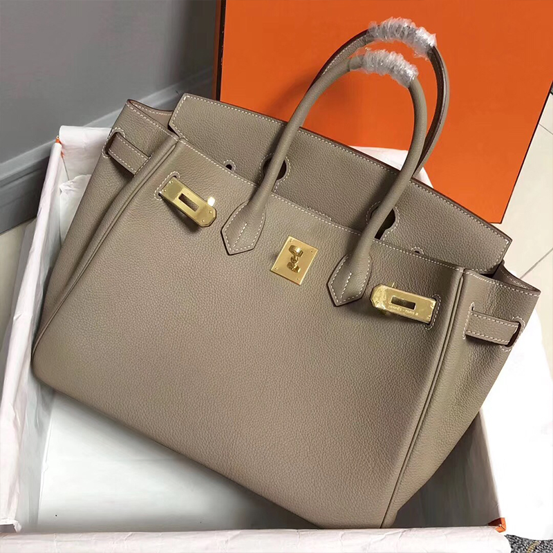 Tienda en línea de réplicas de bolsas de lujo de diseñador para mujeres, de alta calidad, con encanto de piel de vaca, tote de cuero genuino, bolso de mano