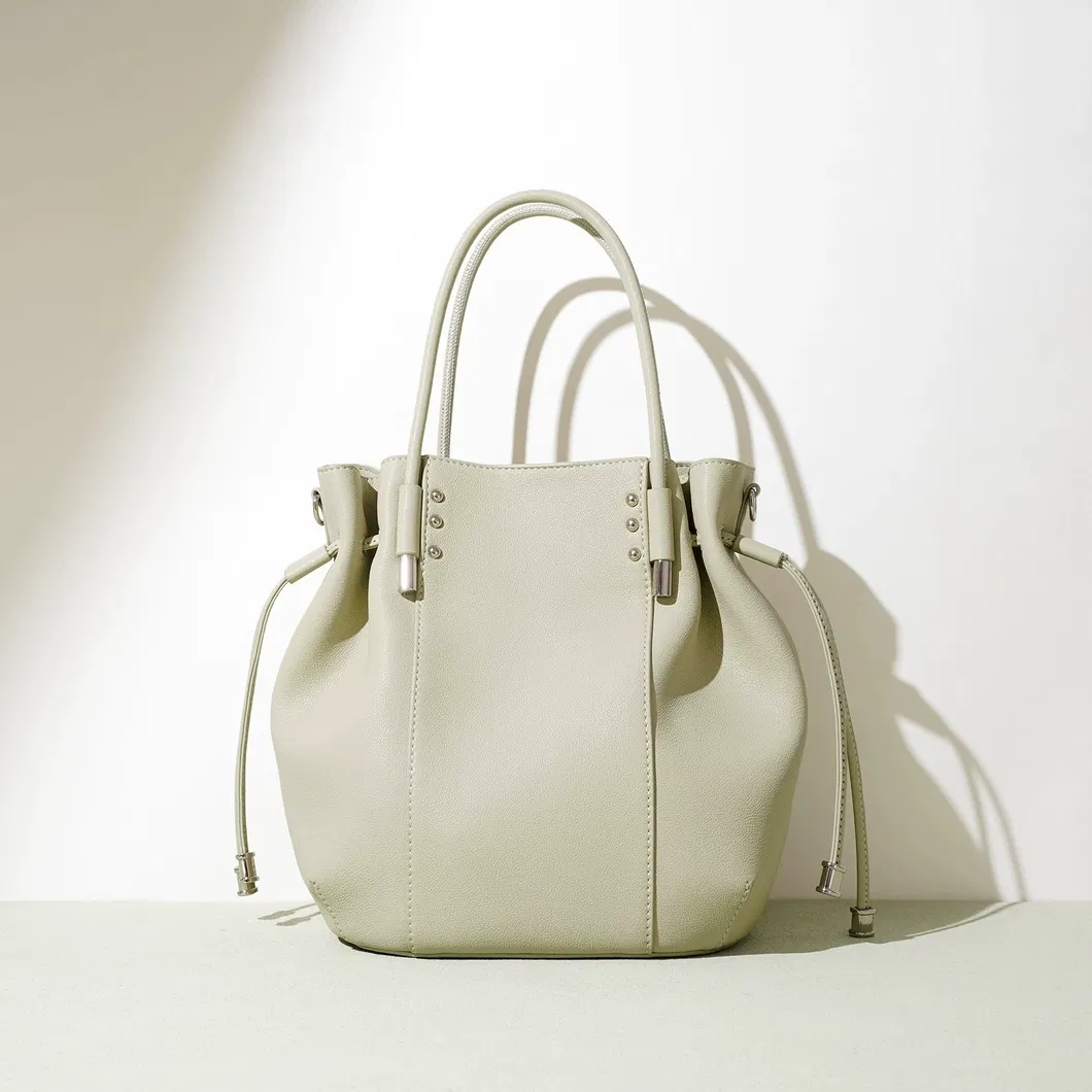 Venta al por mayor de fábrica diseño personalizado tamaño alta calidad textura de cuero genuino bolso para mujeres