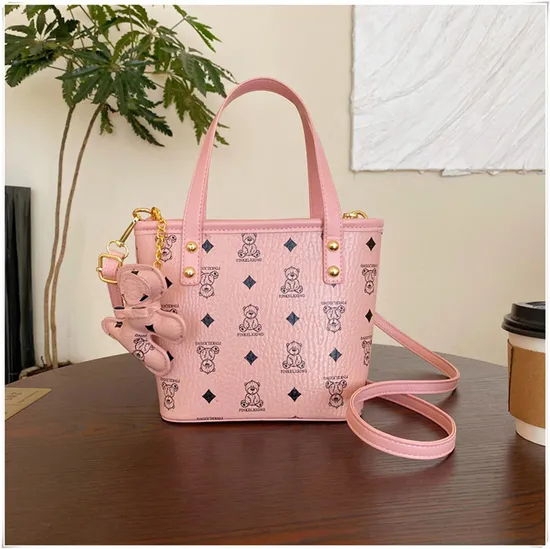 Nueva bolsa de diseñador de textura de nicho, tipo cubo, de mano, a juego, para mujer, bandolera de un solo hombro