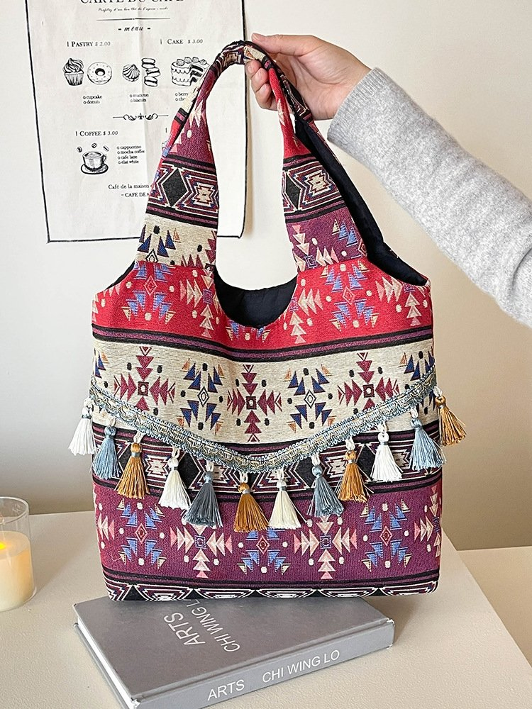 Nuevo estilo étnico bolso de gran capacidad con cierre abierto forro de poliéster correa de hombro personalizada con borlas bolso bohemio para mujeres