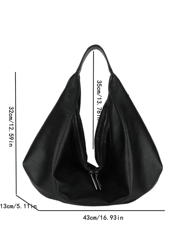 Modelo exhibiendo bolso de viaje 3