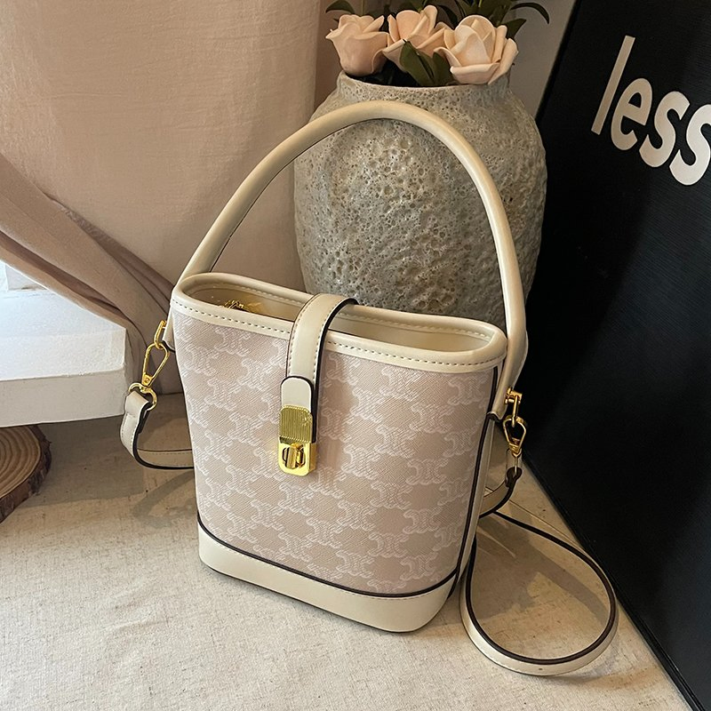 Bolso de mano de lujo de cuero PU cruzado de moda para mujeres, bolso tipo cubo para mujeres, distribuidor del mercado mayorista, fabricante OEM, Guangzhou