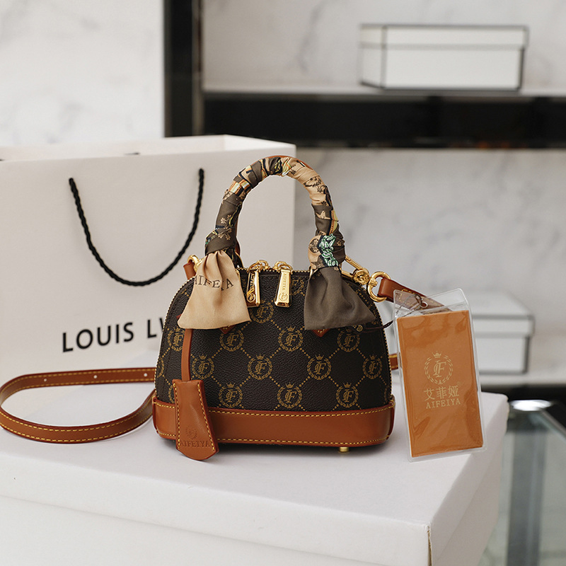 Ofertas directas de fábrica de moda vegana bolso de lujo de cuero bolso cruzado de hombro bolsas impresas de concha estilo