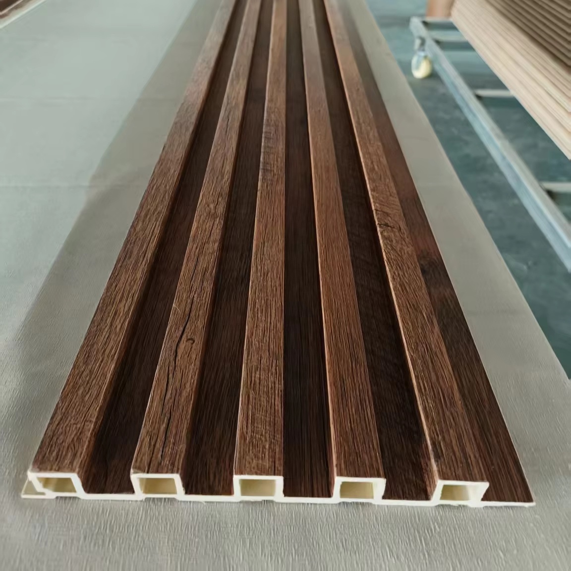 Wooden Grain WPC Wall Decor Panel PVC Wpc Wall Cladding For Interior Fluted Panel For Bedroom Workshop Application Plastic