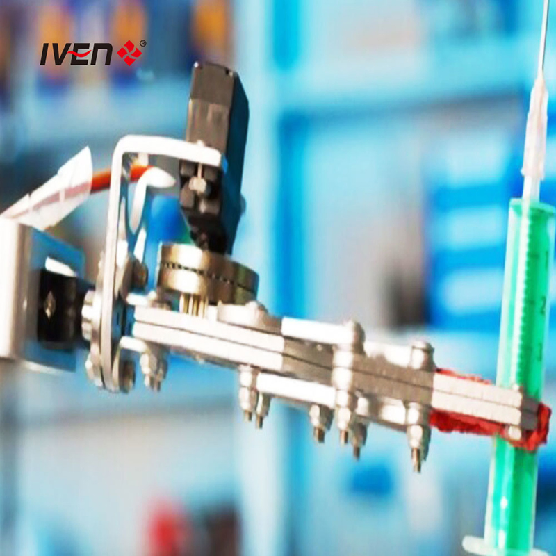 Syringe Feeding and Assembly System for Efficient and Automated Product Handling