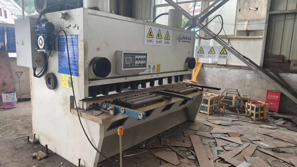 Shearing process for metal fabrication in logistics cargo preparation