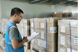 Forklifts operating in warehouse
