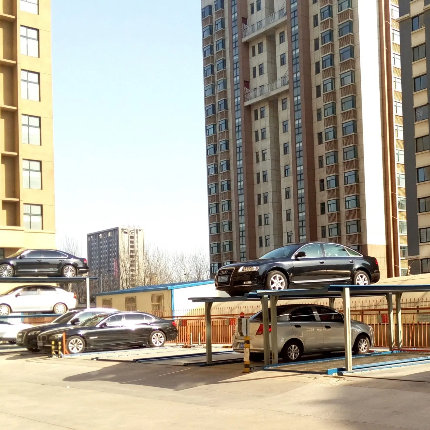 Compact Four Post Parking Solution for Residential Buildings and Private Garages