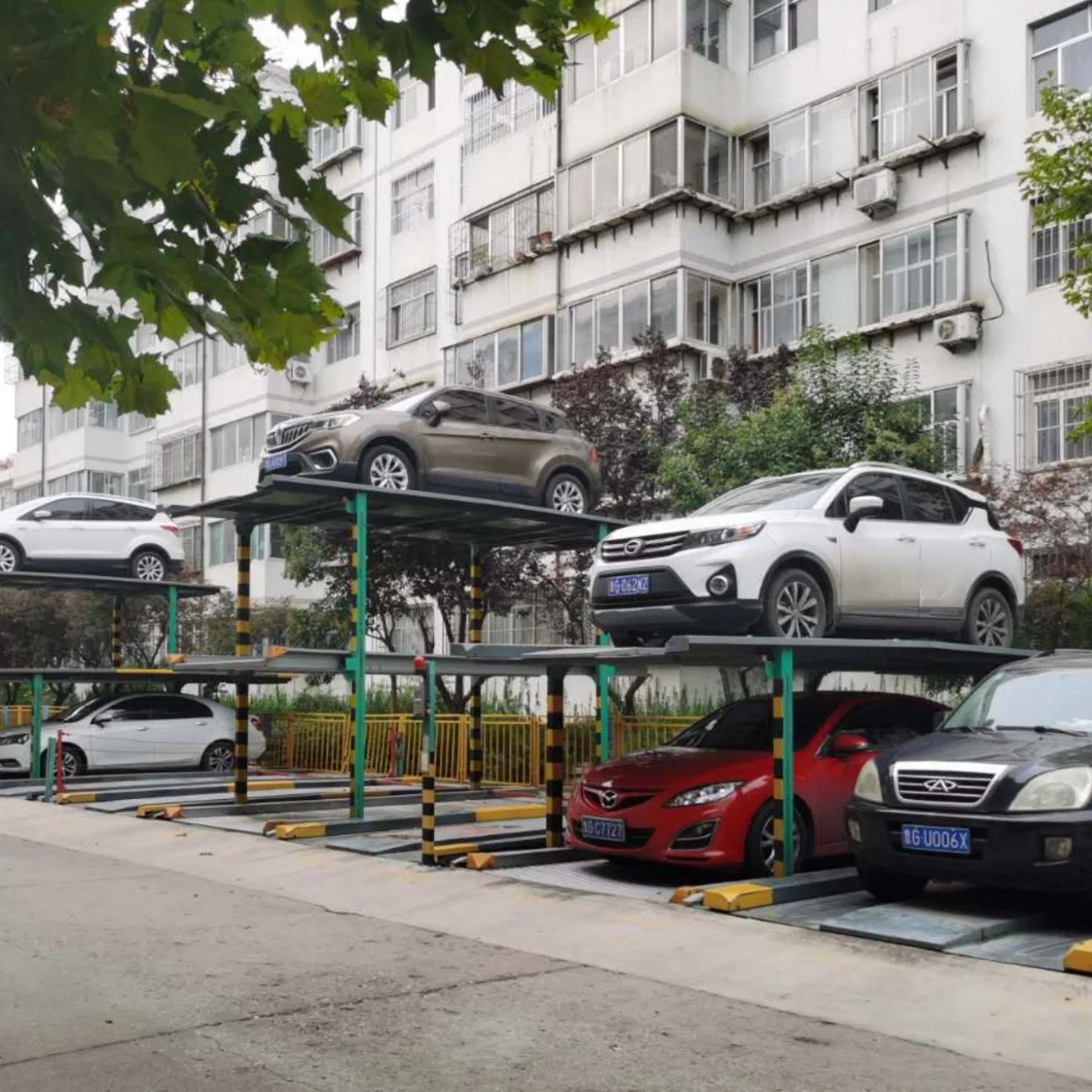 Compact Four Post Parking Solution for Residential Buildings and Private Garages