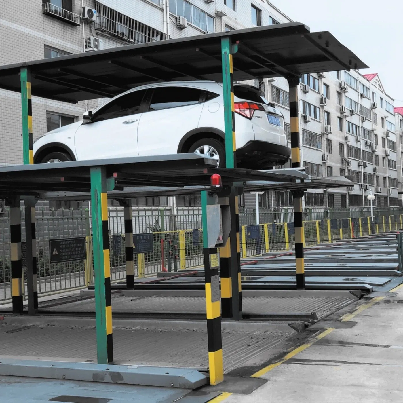 Smart Four Post Parking Solution with Real Time Monitoring and Predictive Maintenance