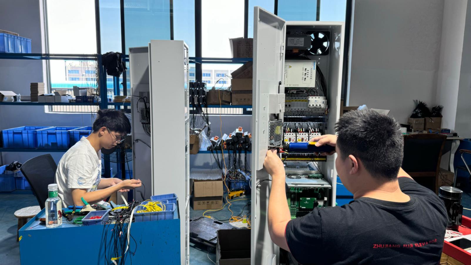 DHI Lift elevator assembly line — systematic component assembly in smart factory