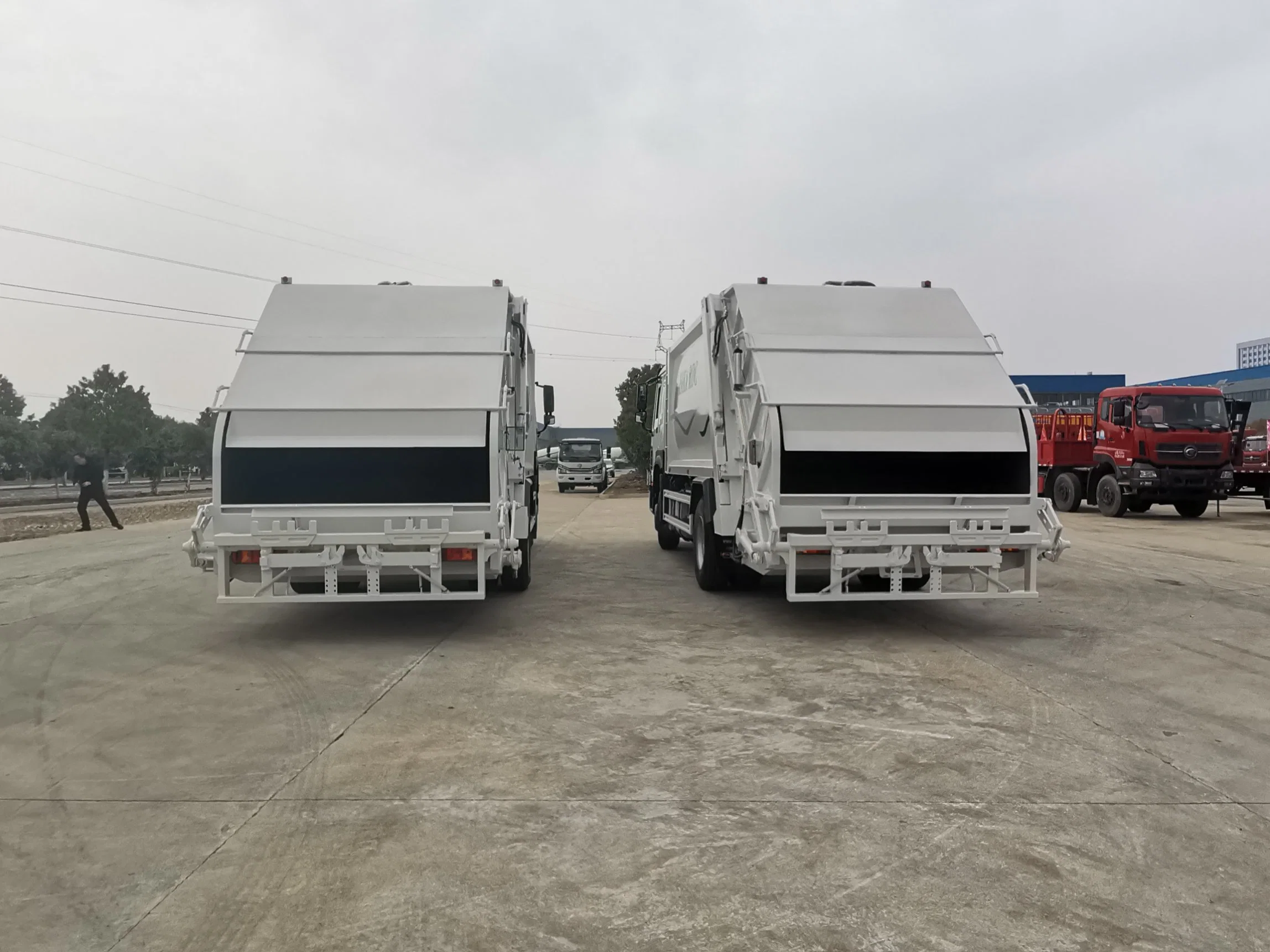 Sinotruk HOWO Africa Refuse Garbage Compactor Hook Lift Swing Arm Collection Transfer Truck 4cbm to 15 M3 Heavy Duty China Manufacturer Best Price for Sale