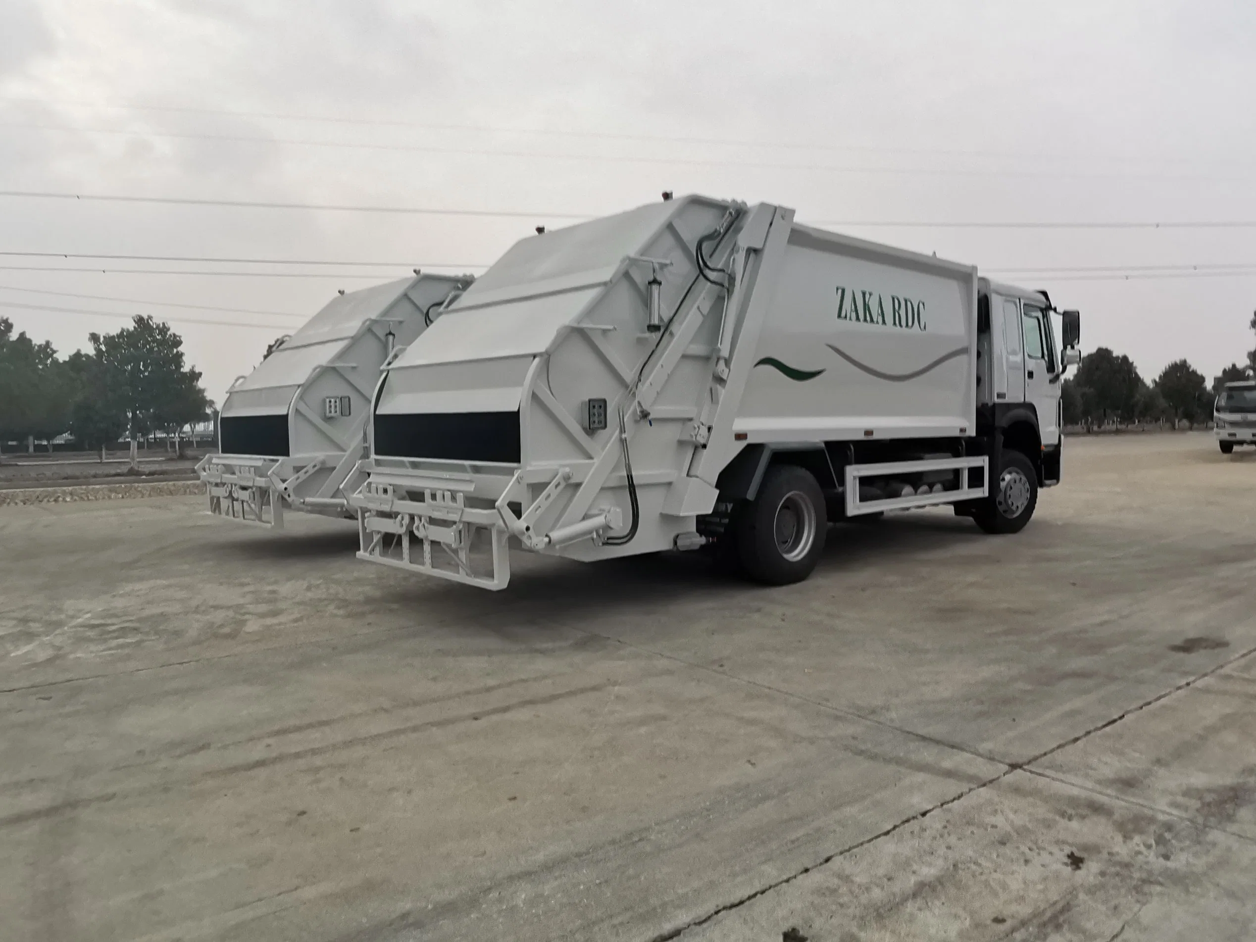 Sinotruk HOWO Africa Refuse Garbage Compactor Hook Lift Swing Arm Collection Transfer Truck 4cbm to 15 M3 Heavy Duty China Manufacturer Best Price for Sale