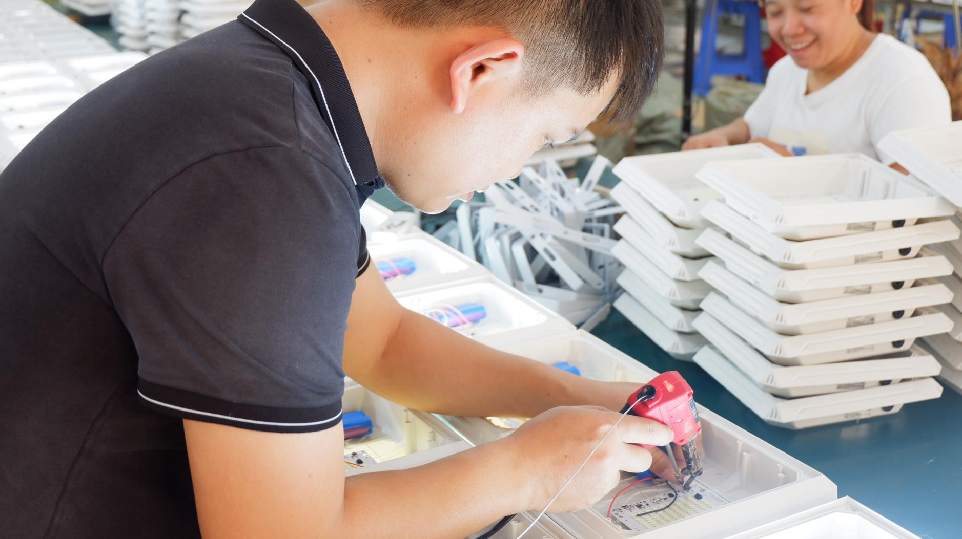 Professional welding process at NexLt Light production facility