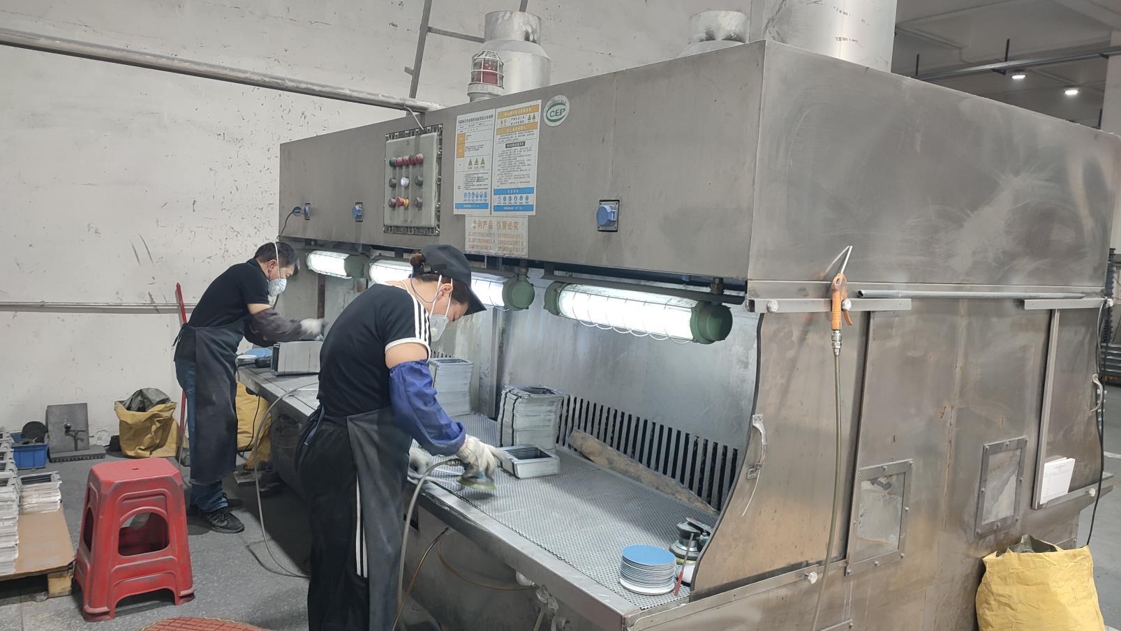 Surface polishing of LED light housing at Lijah Light factory