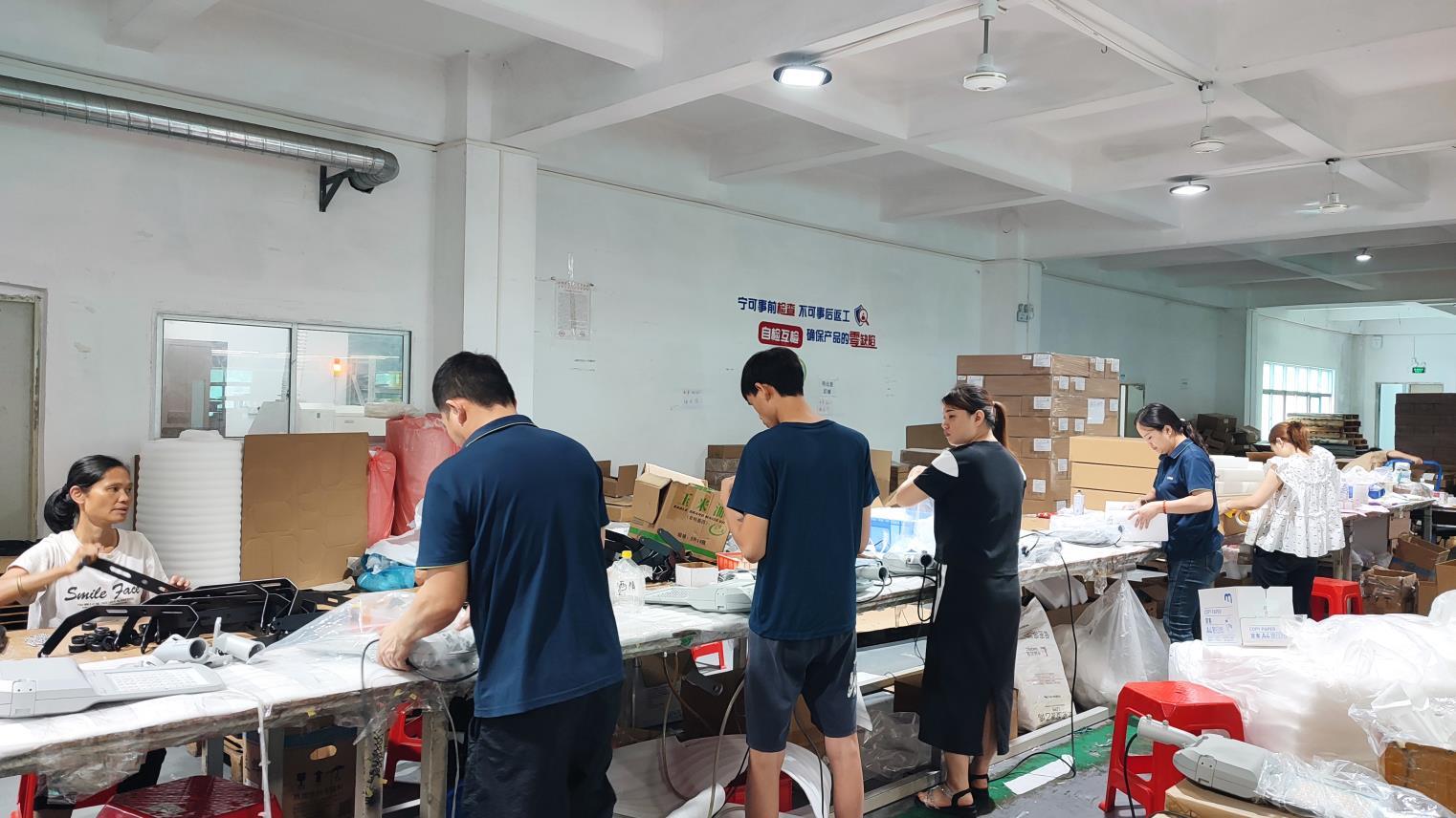 Final packaging of LED lighting products at Lijah Light warehouse