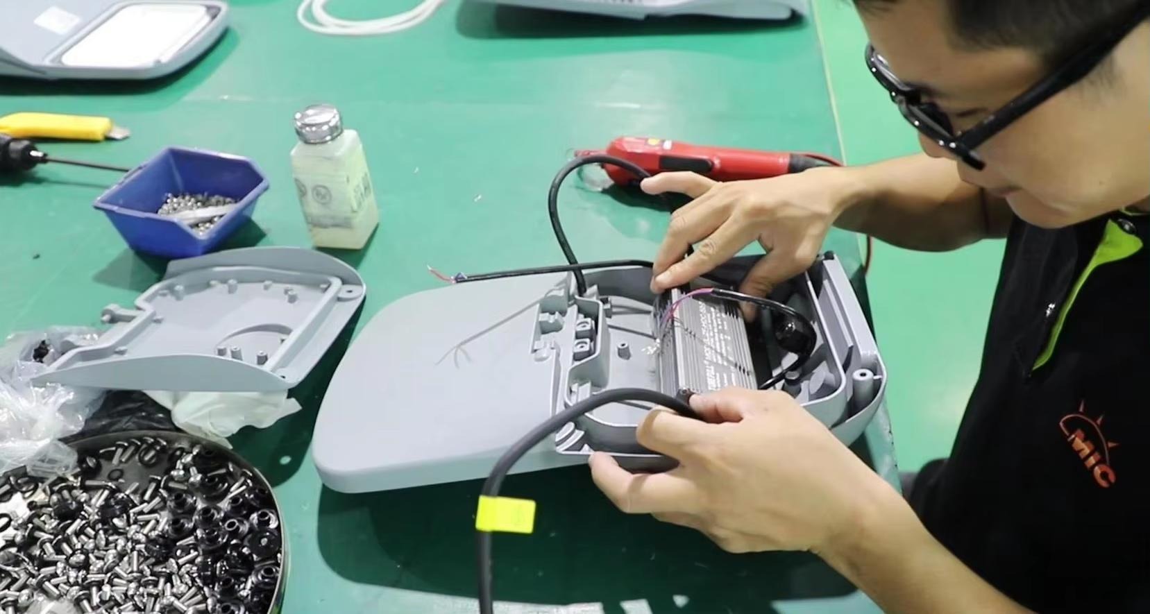 LED light fixture parts assembling process step 1 at Lijah Light