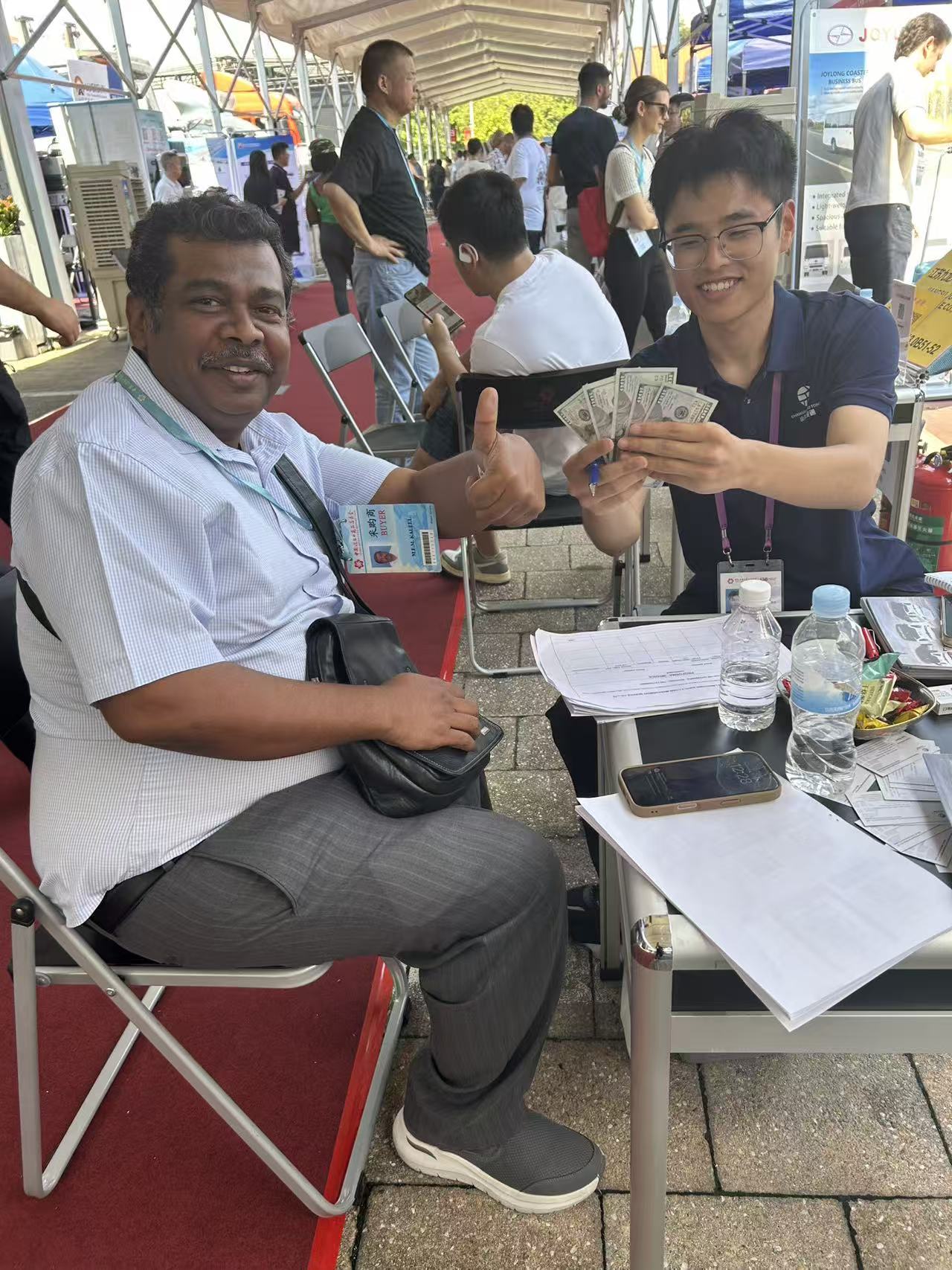 Li Mao Tong Group at international trade exhibition — electric vehicle showcase