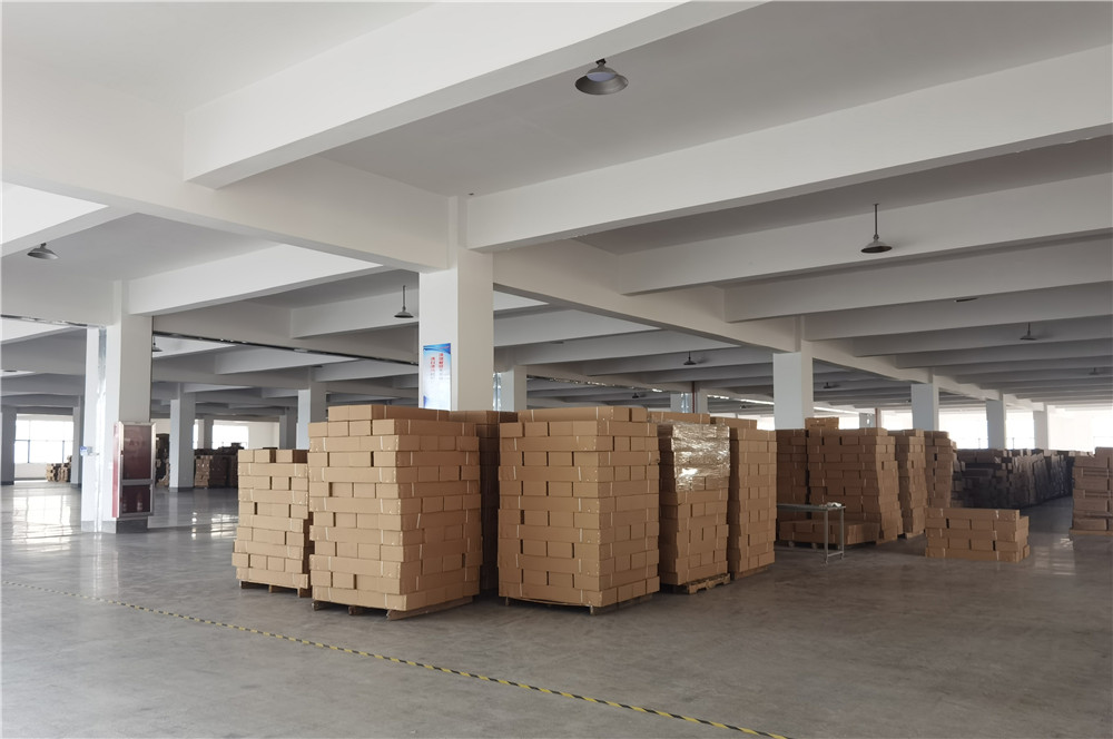 Funjump finished product warehouse - stacked trampoline inventory ready for shipment