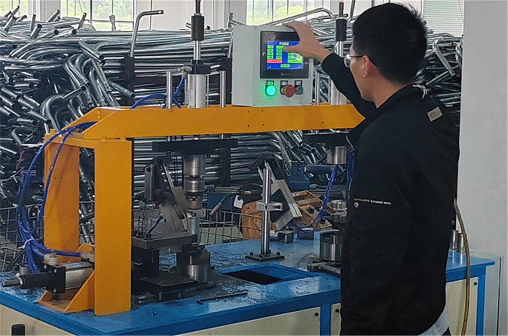 Funjump metalworking workshop - final frame quality check before next stage