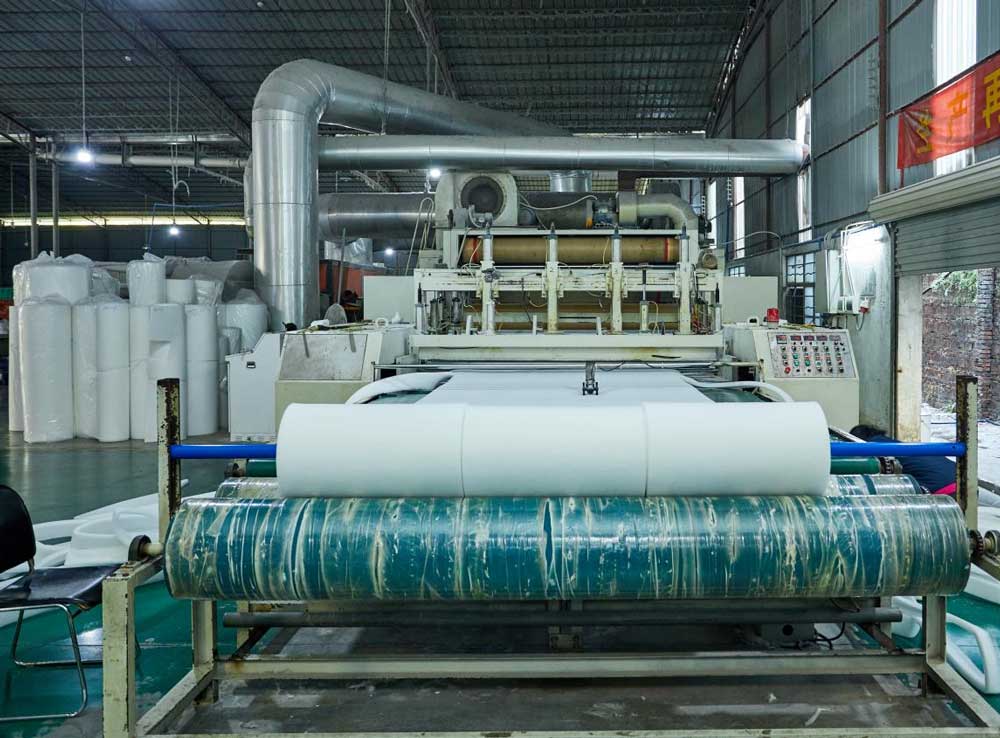 LJF air filter production step 4 - Rolling up filter media