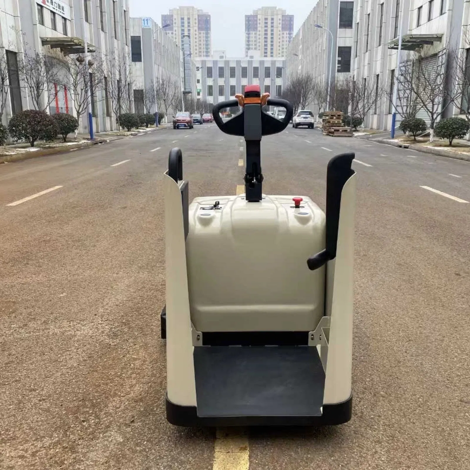 4-10 Ton Semi-Enclosed Ride-on Electric Pallet Truck Heavy-Duty Stand-on Pallet Jack for Warehouse Use