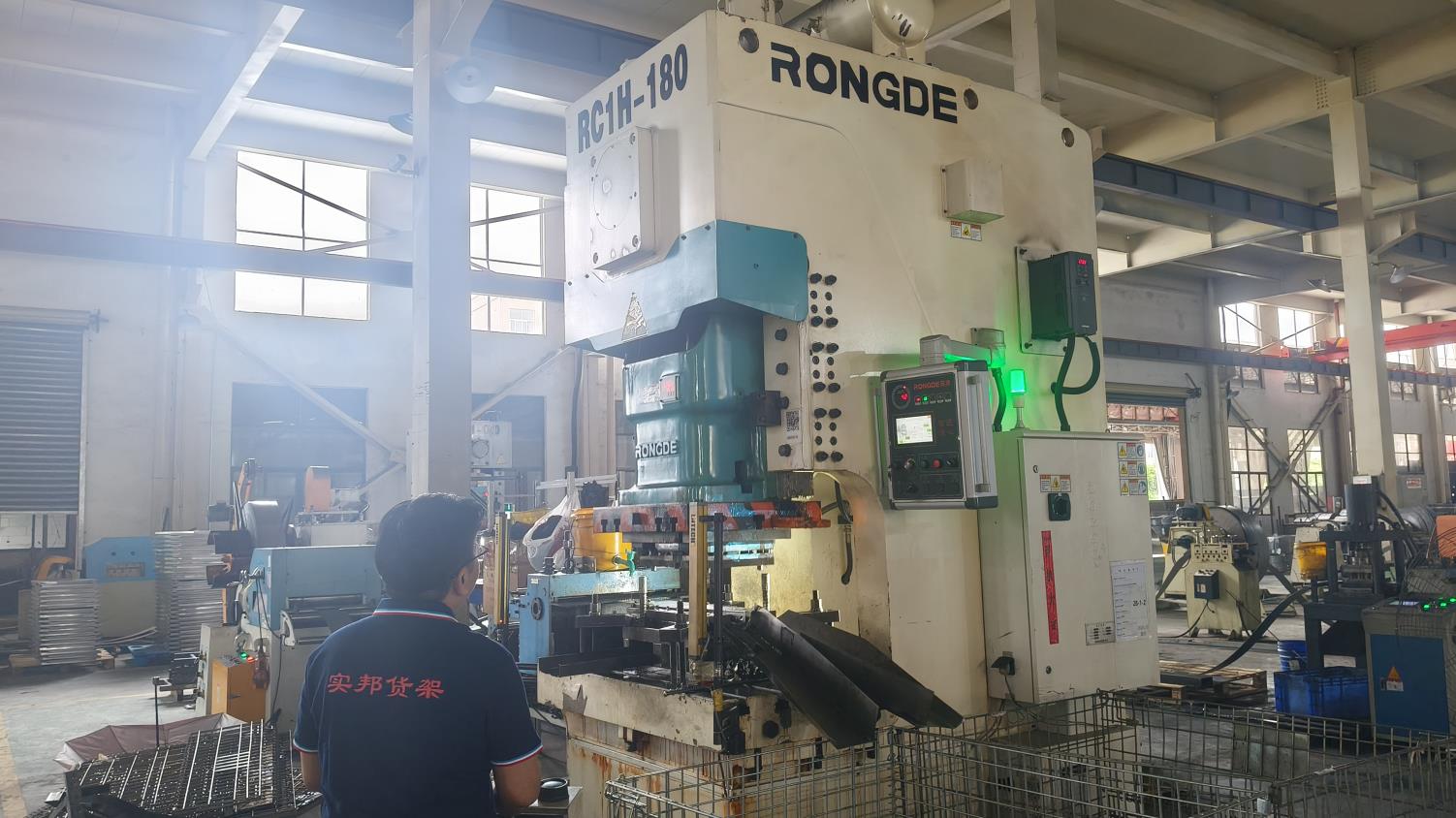 Hydraulic punching process for racking uprights and beams