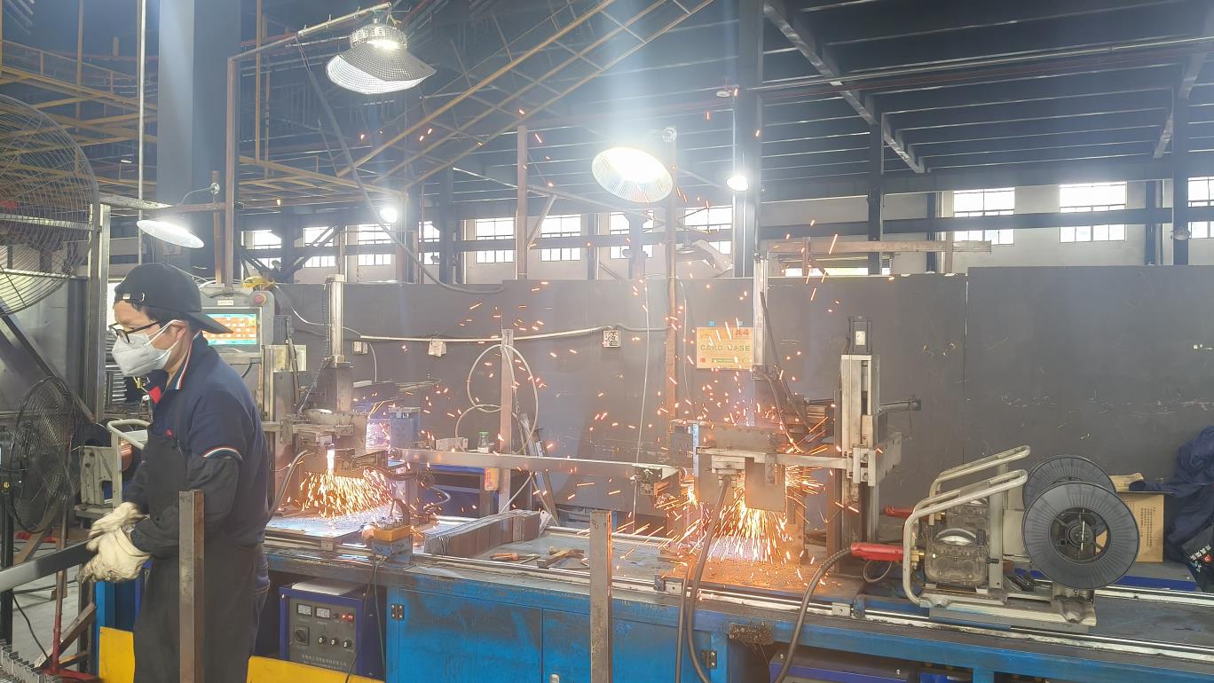 Bonding machine for steel component assembly