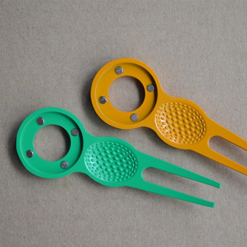 Divot Tool Metalwork