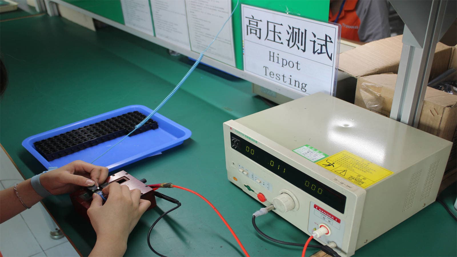 Hi-pot high voltage testing for optical transceiver safety compliance