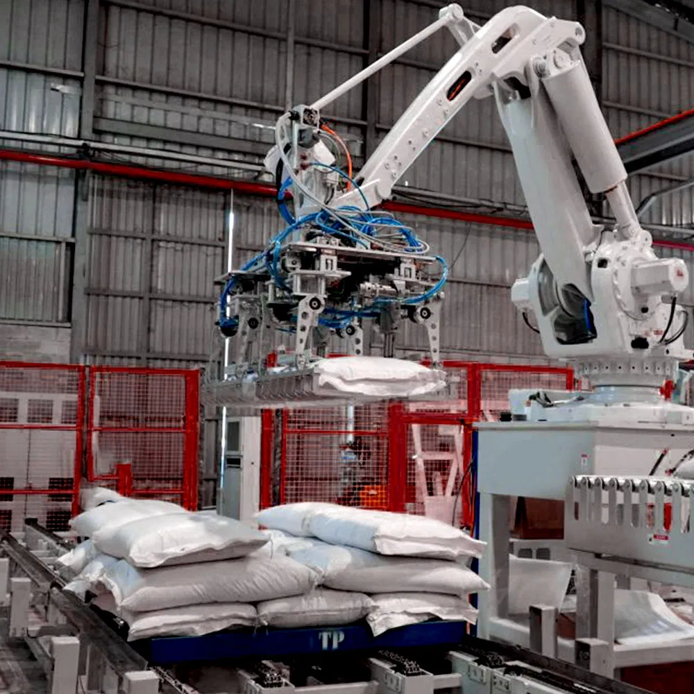 High Speed Robotic Bag Palletizer System with a Bag Flattener and Curved Infeed Conveyor
