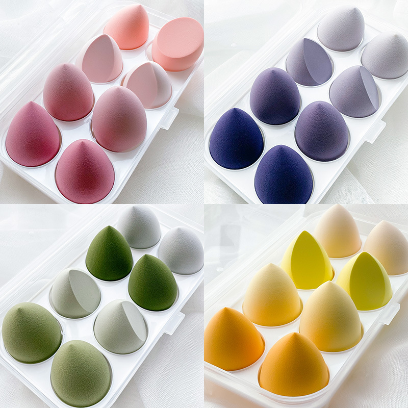 Esponjas de maquillaje de microfibra súper suaves en estuche de silicona plástica colorido para difuminar y eliminar el maquillaje, empaquetado reutilizable