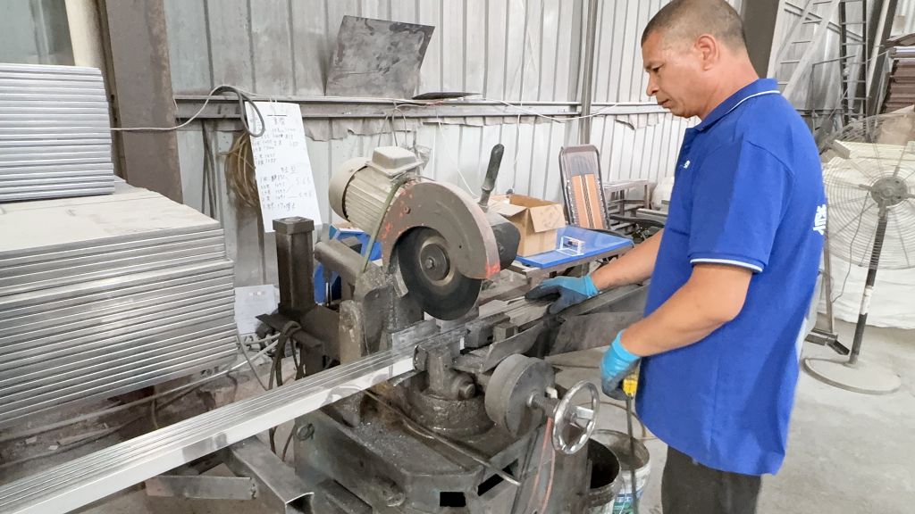 Industrial cutting machine for warehouse rack steel profiles