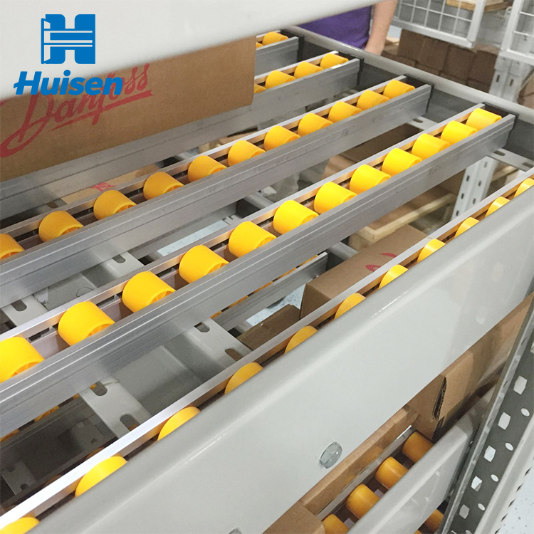Automated Adjustable High Density Gravity Roller Shelves Steel Flow Rack Shelving System for Warehouse Storage