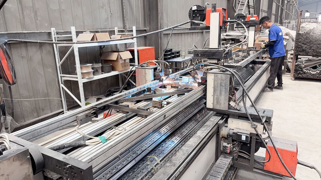 Column welding process for warehouse rack upright frames