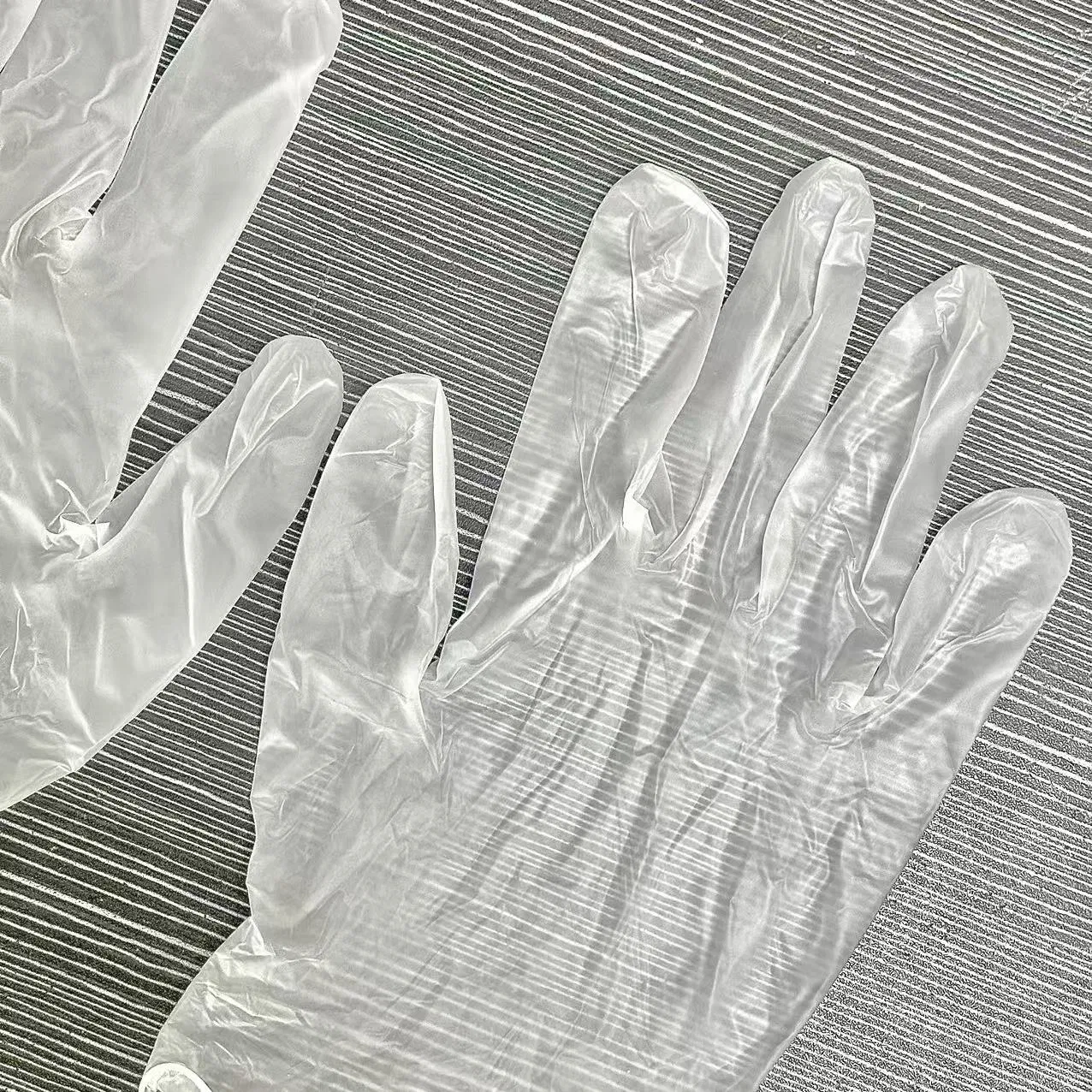 قفازات فحص فنتيل disposable مسحوقة وغير مسحوقة من PVC