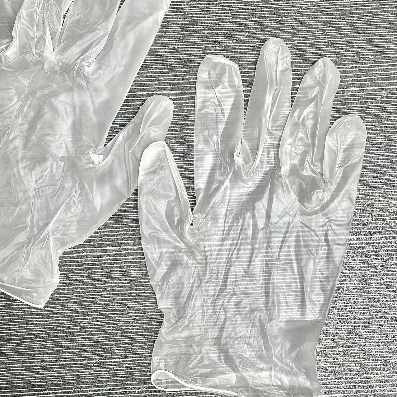 قفازات فحص فنتيل disposable مسحوقة وغير مسحوقة من PVC