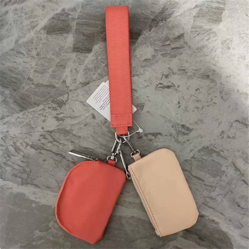 Llave de mano libre, bolsa de doble pouch, logo tejido personalizado, llavero de nylon, tarjetero, billeteras, bolso