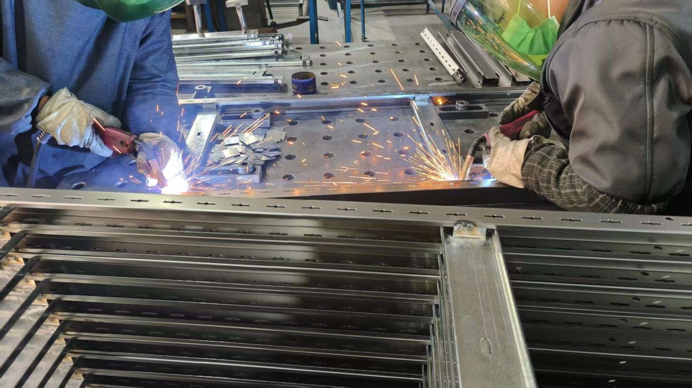 MIG welding process for industrial rack structure assembly