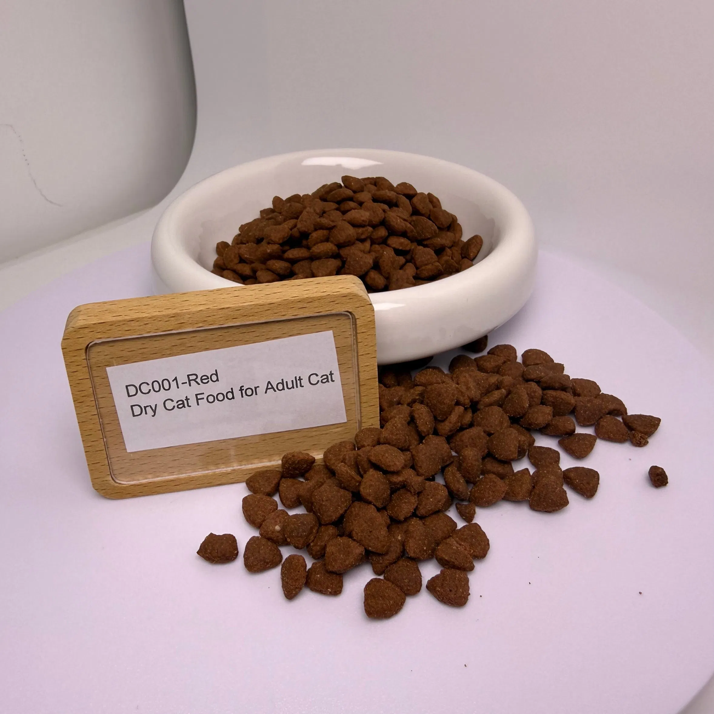 Alimento seco rojo de alta energía para gatos que satisface las necesidades diarias de actividad de las mascotas felinas adultas