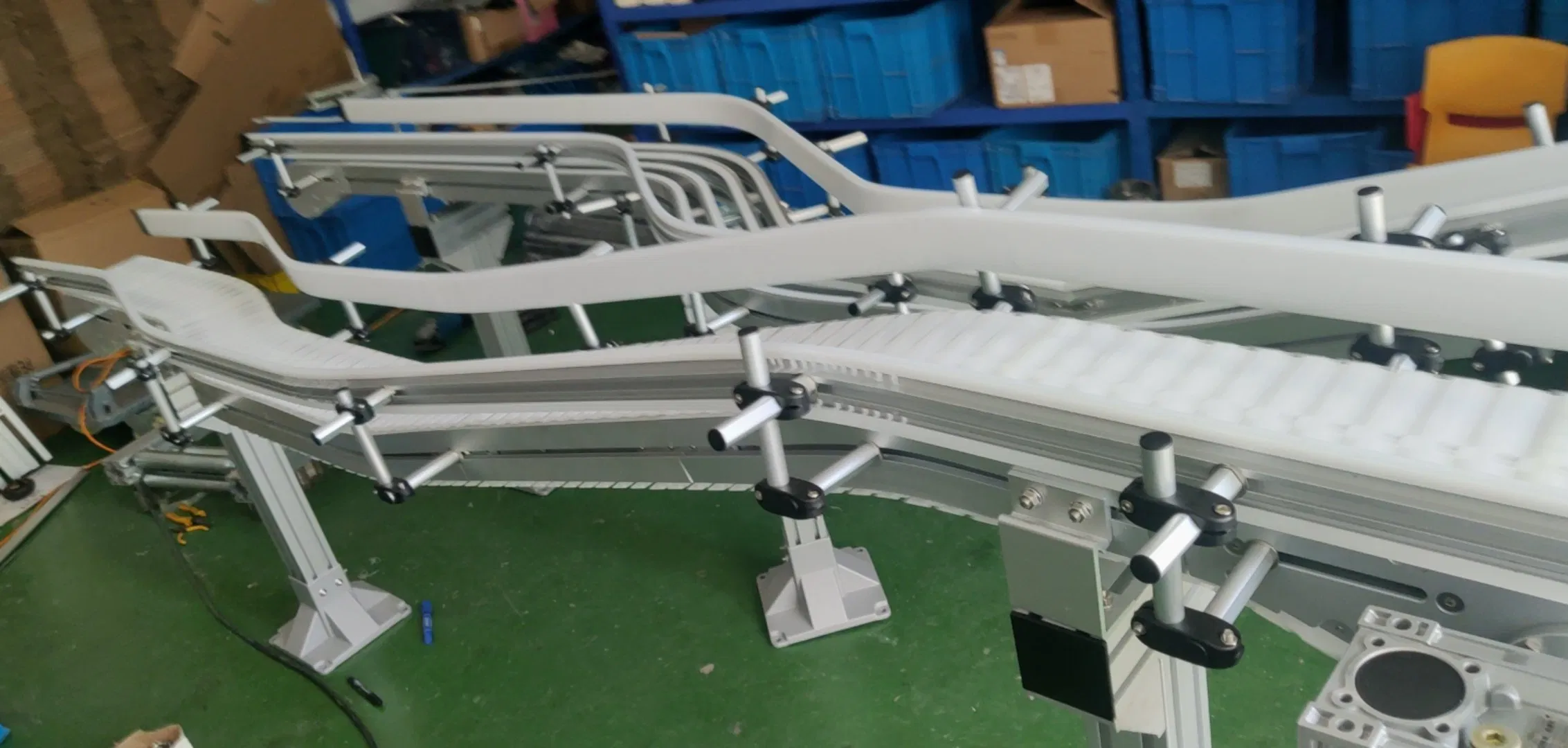 Moduline Conveyor Systems with Cleat Chains